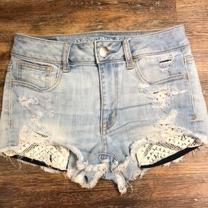 AE women’s distressed high wasted shorts